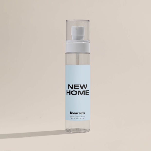 A product shot of the New Home Room Spray.