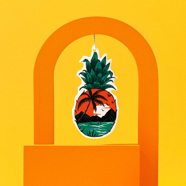 Lifestyle image of a car freshener in an abstract scene